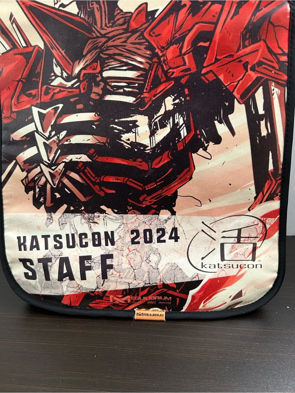 Equilibrium Katsucon 2024 Mecha Anime Staff Bag designed by Sarah Miller